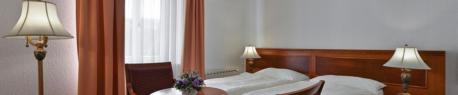 Hotel Continental - Zimmerbeispiel - Kururlaub in Marienbad mit Haustürabholung